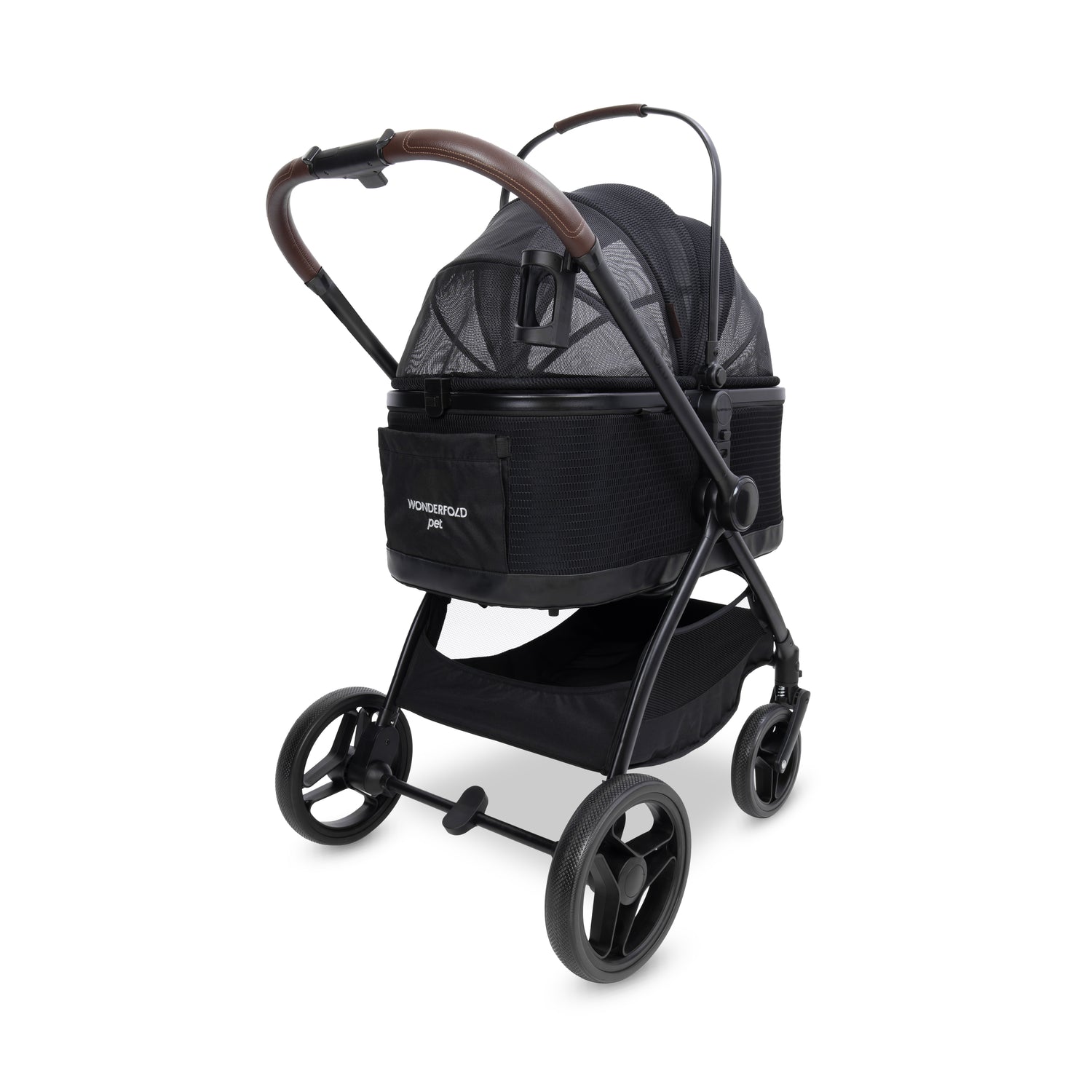Angled rear view of the P3 Pet Stroller with enclosed mesh carrier and brown faux leather handle.